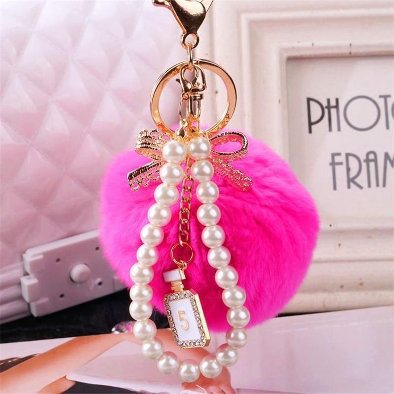 Unique Key Chain 2021 Pearl Crystal Bottle Bow Pompom Fluffy Puff Ball Keychains