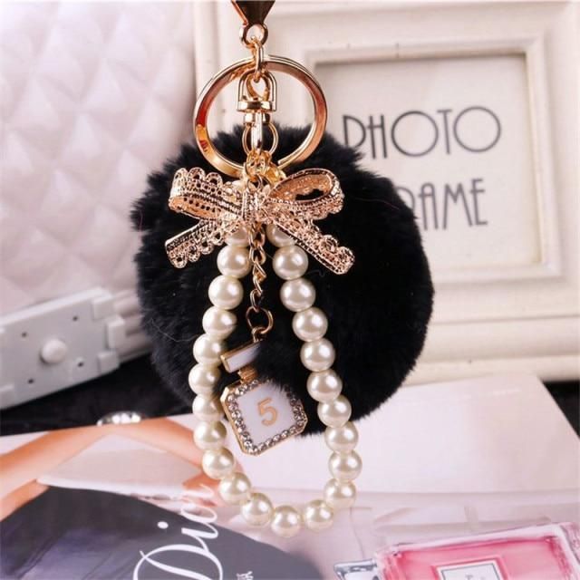 Unique Key Chain 2021 Pearl Crystal Bottle Bow Pompom Fluffy Puff Ball Keychains