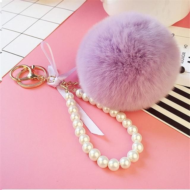 Unique Key Chain 2021 Pearl Crystal Bottle Bow Pompom Fluffy Puff Ball Keychains