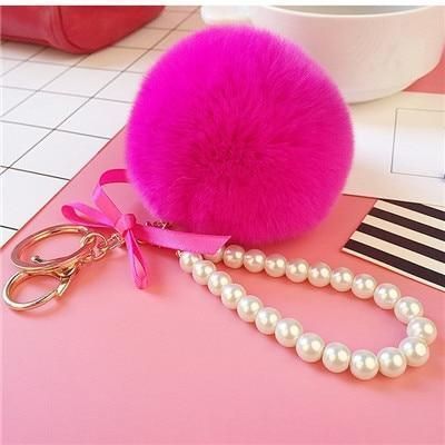 Unique Key Chain 2021 Pearl Crystal Bottle Bow Pompom Fluffy Puff Ball Keychains