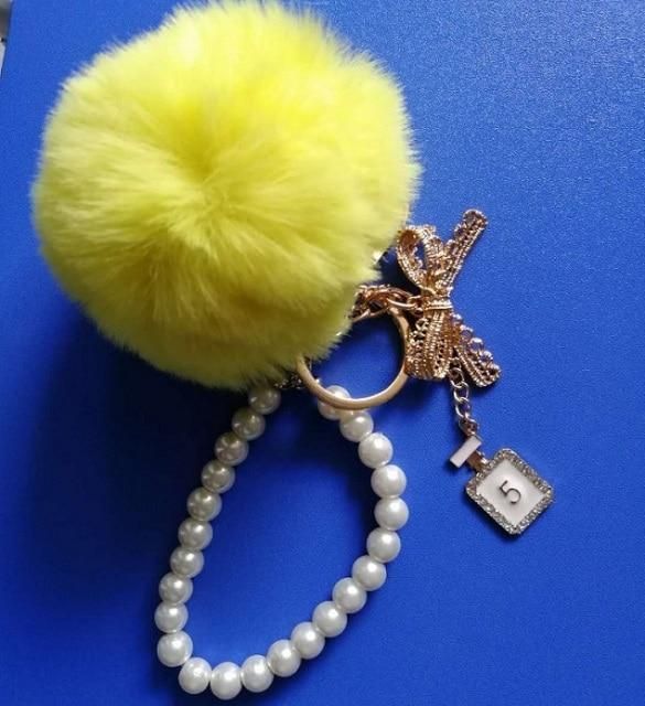 Unique Key Chain 2021 Pearl Crystal Bottle Bow Pompom Fluffy Puff Ball Keychains